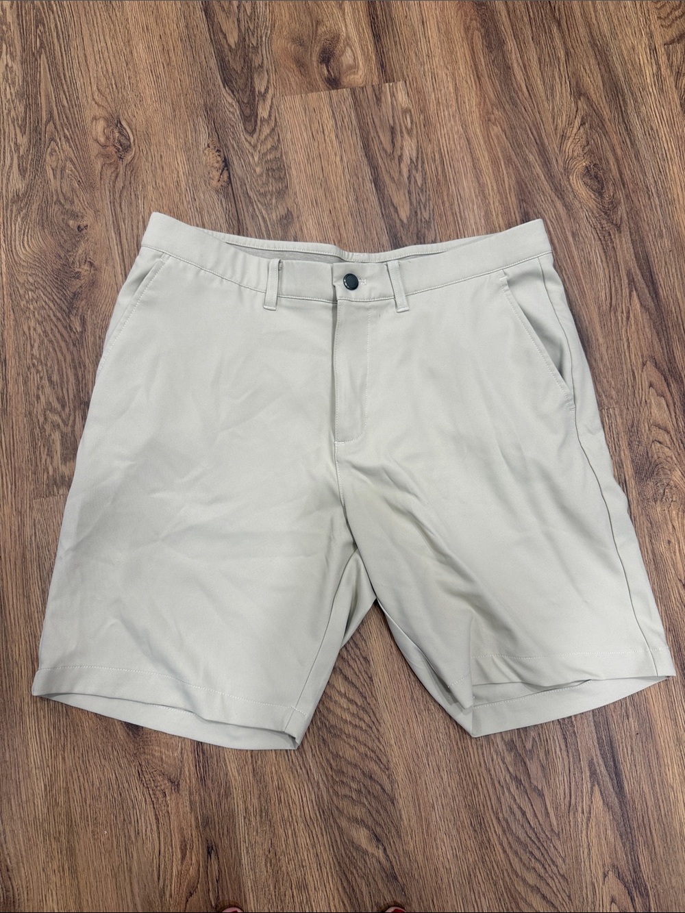 Kirkland Signature Men’s Flat-Front Shorts in Light Khaki
